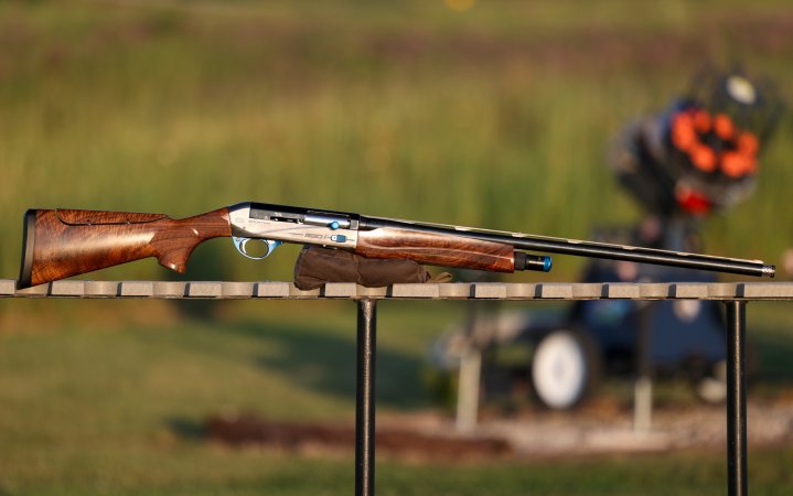  The Breda 930i Sporting shotgun resting on a table.