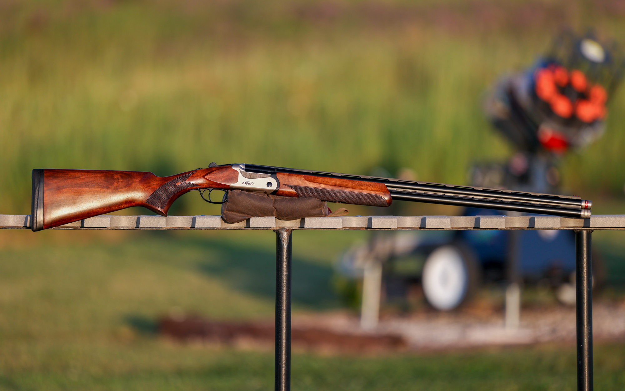  The Tristar Cypher o/u rests on a table at the range.