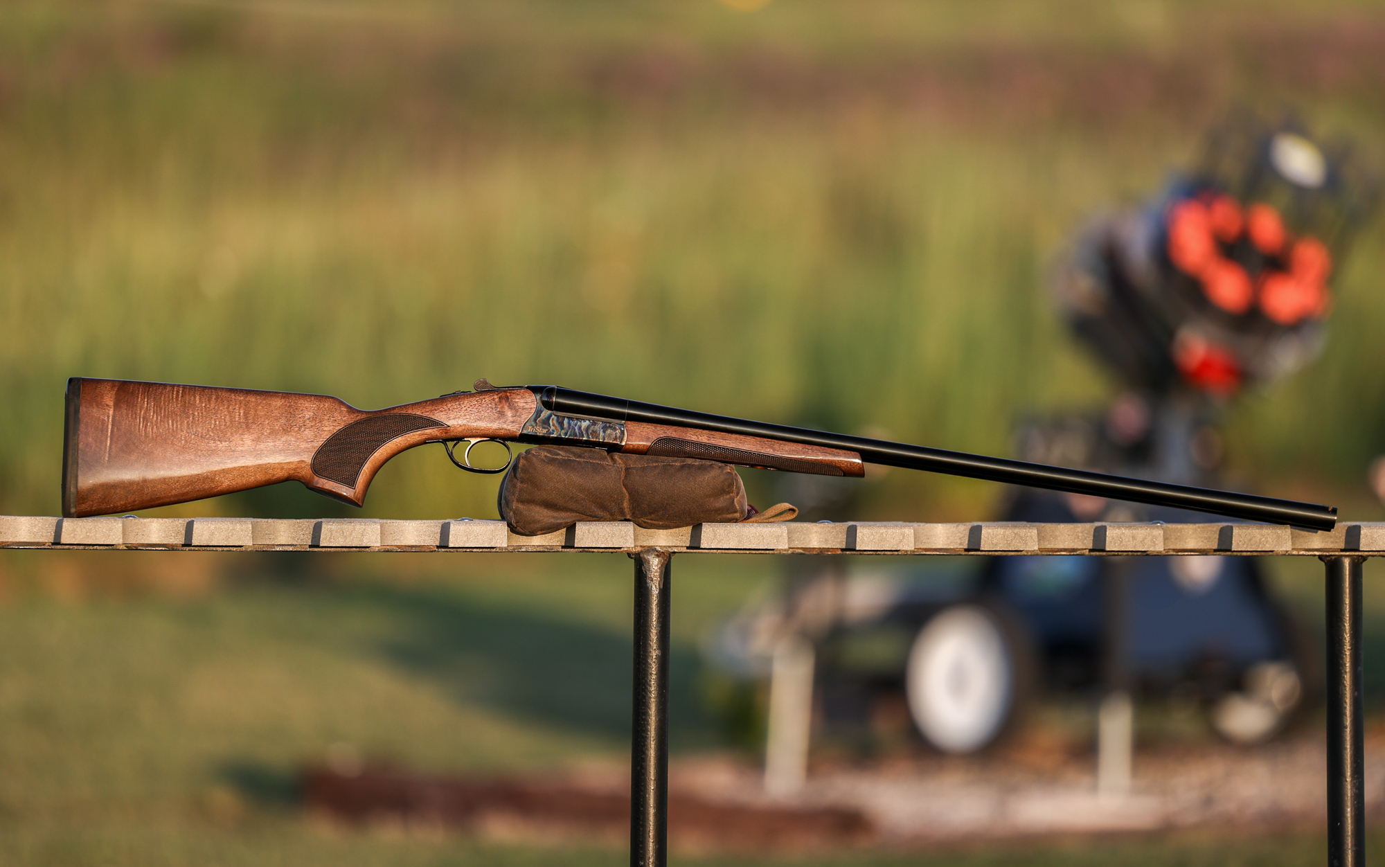  The Tristar Phoenix side by side shotgun rests on a table.