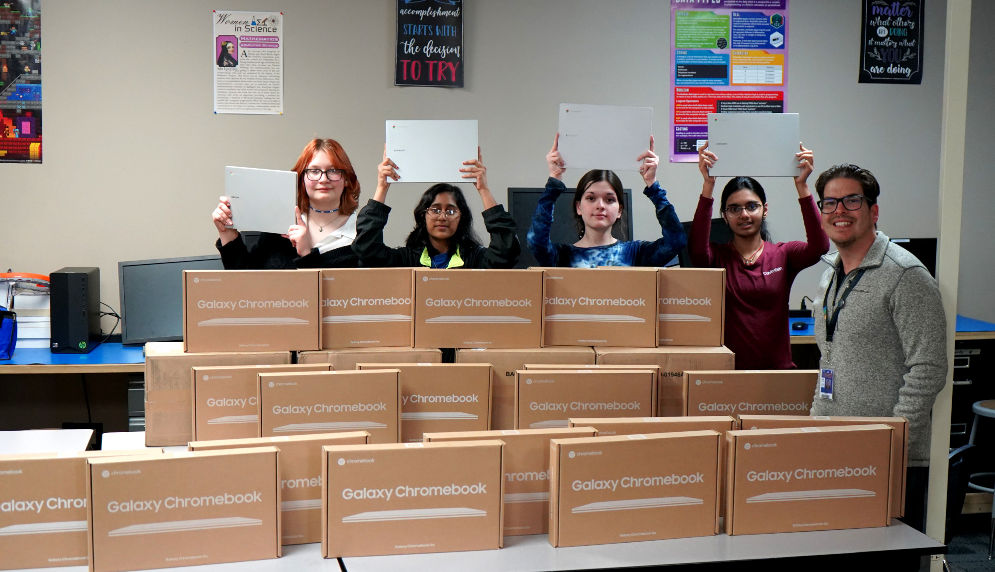 STEM students with laptops.