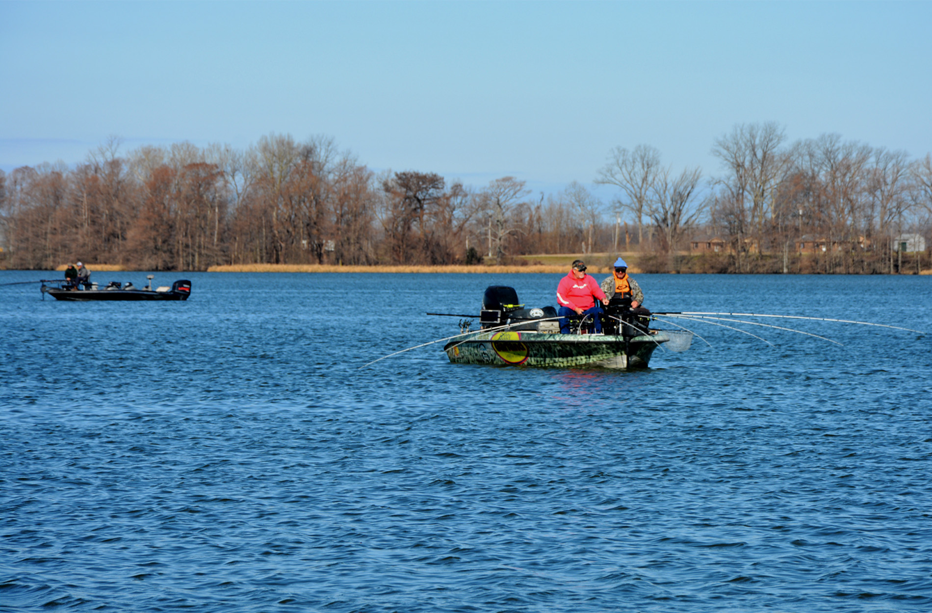 Crappie fishermen on lake.