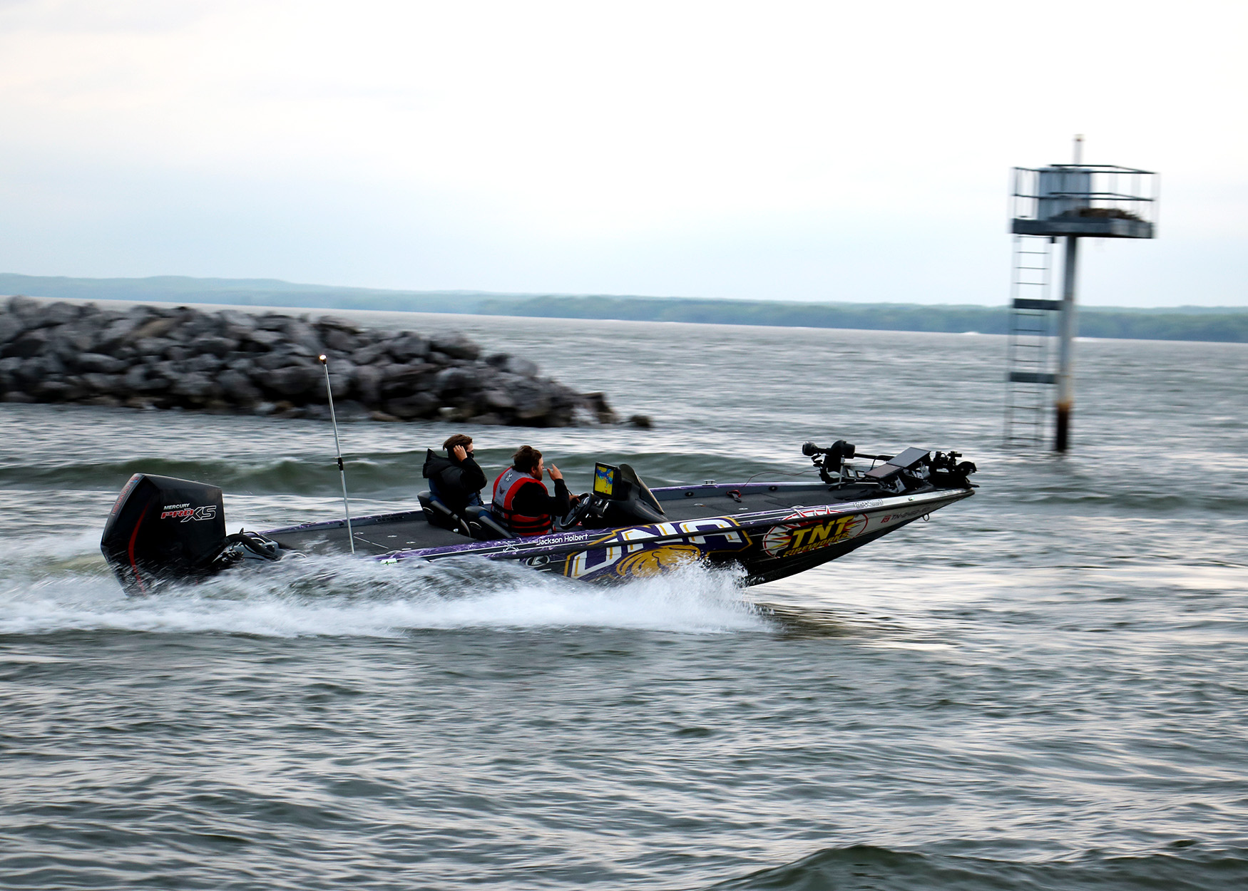 A boat heads out into the main lake.