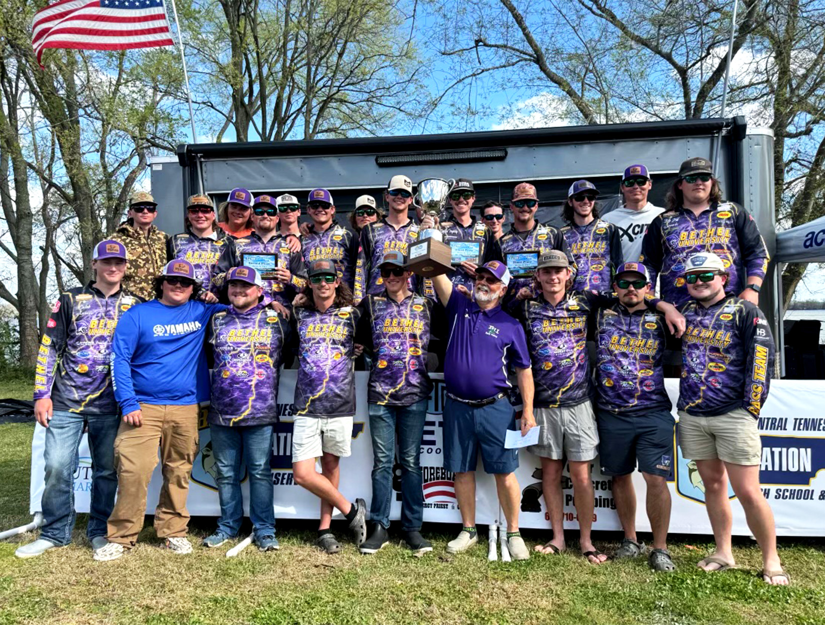 A team of college anglers celebrates after a win.