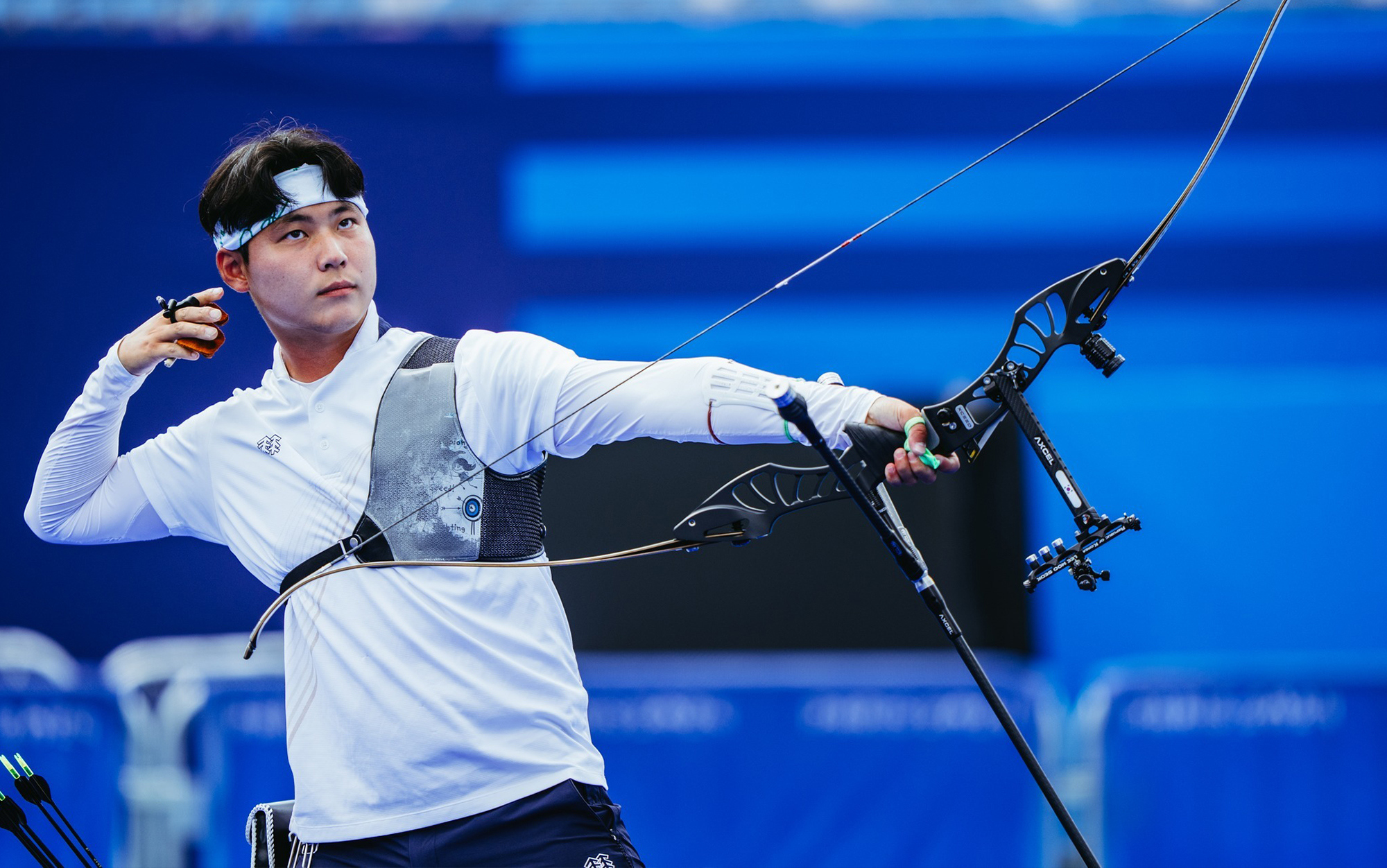 Lee Wooseok shoots for Korea's men's archery team.