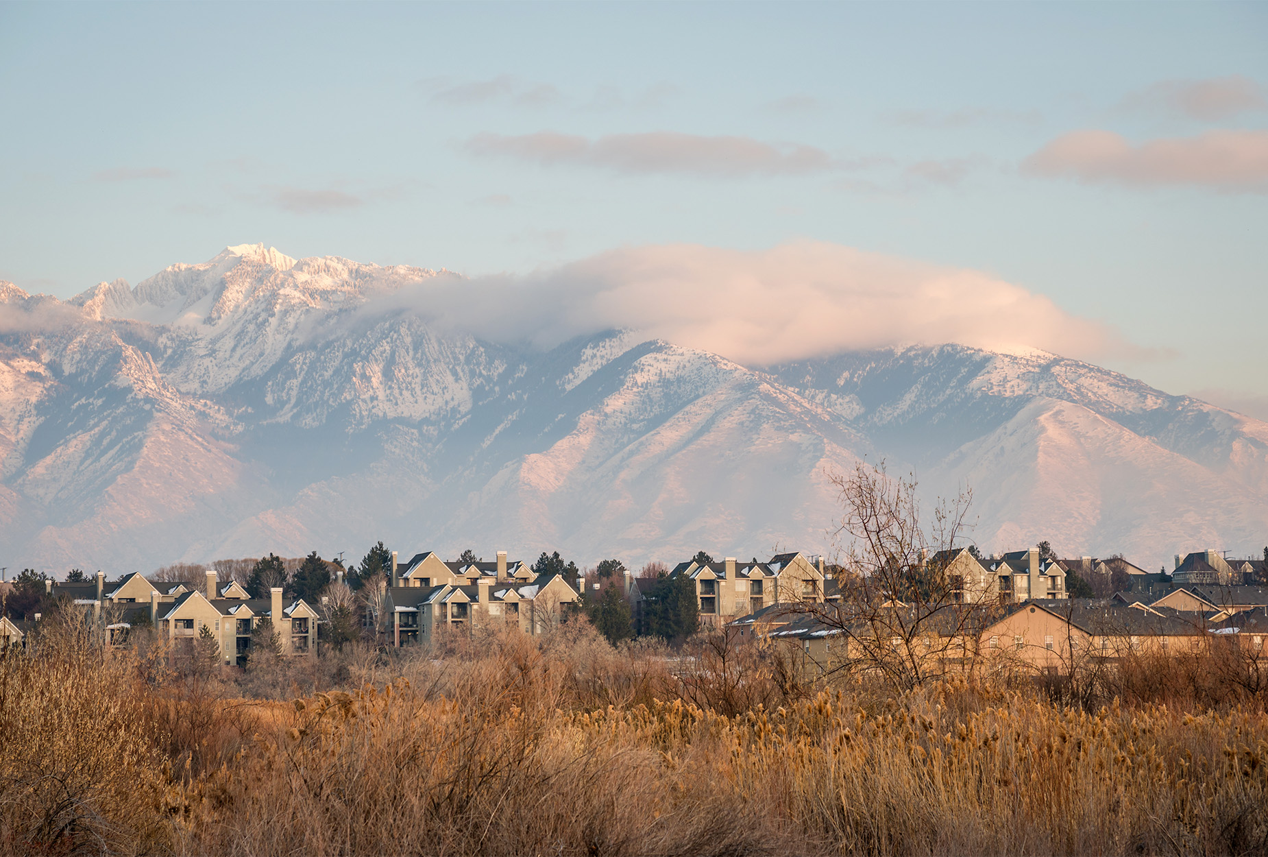 Houses with mountains in background.