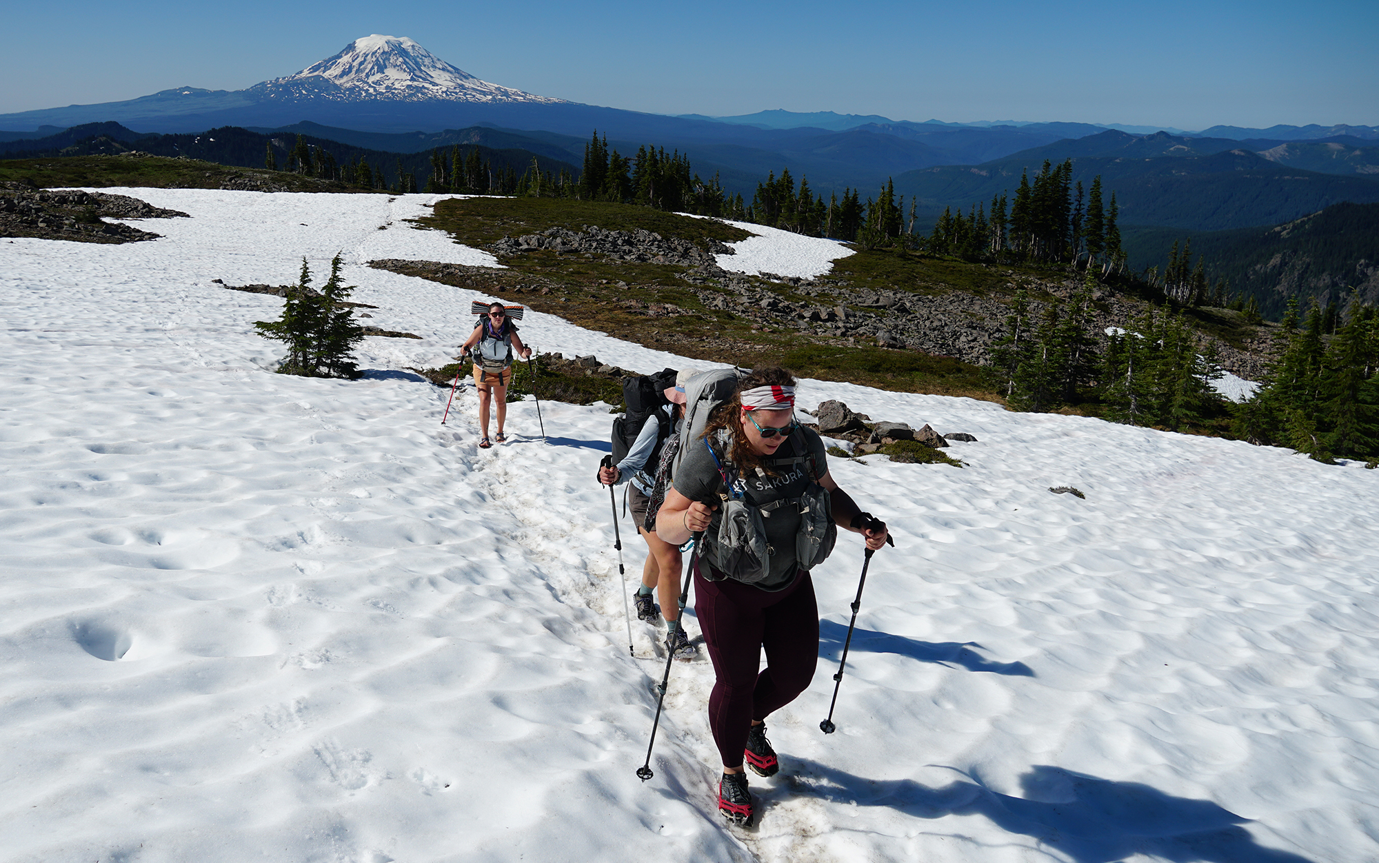 Hiker uses the Flash Carbons to cross a snowfield.