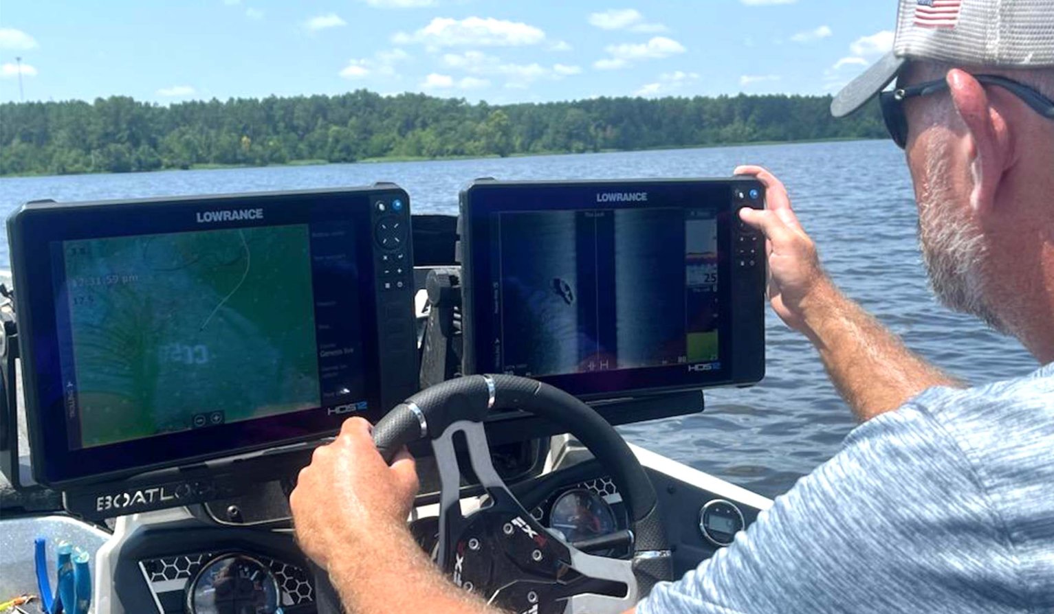 An angler scans using a side-imaging fish finder