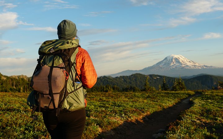 Hiker wears a value ultralight backpack.