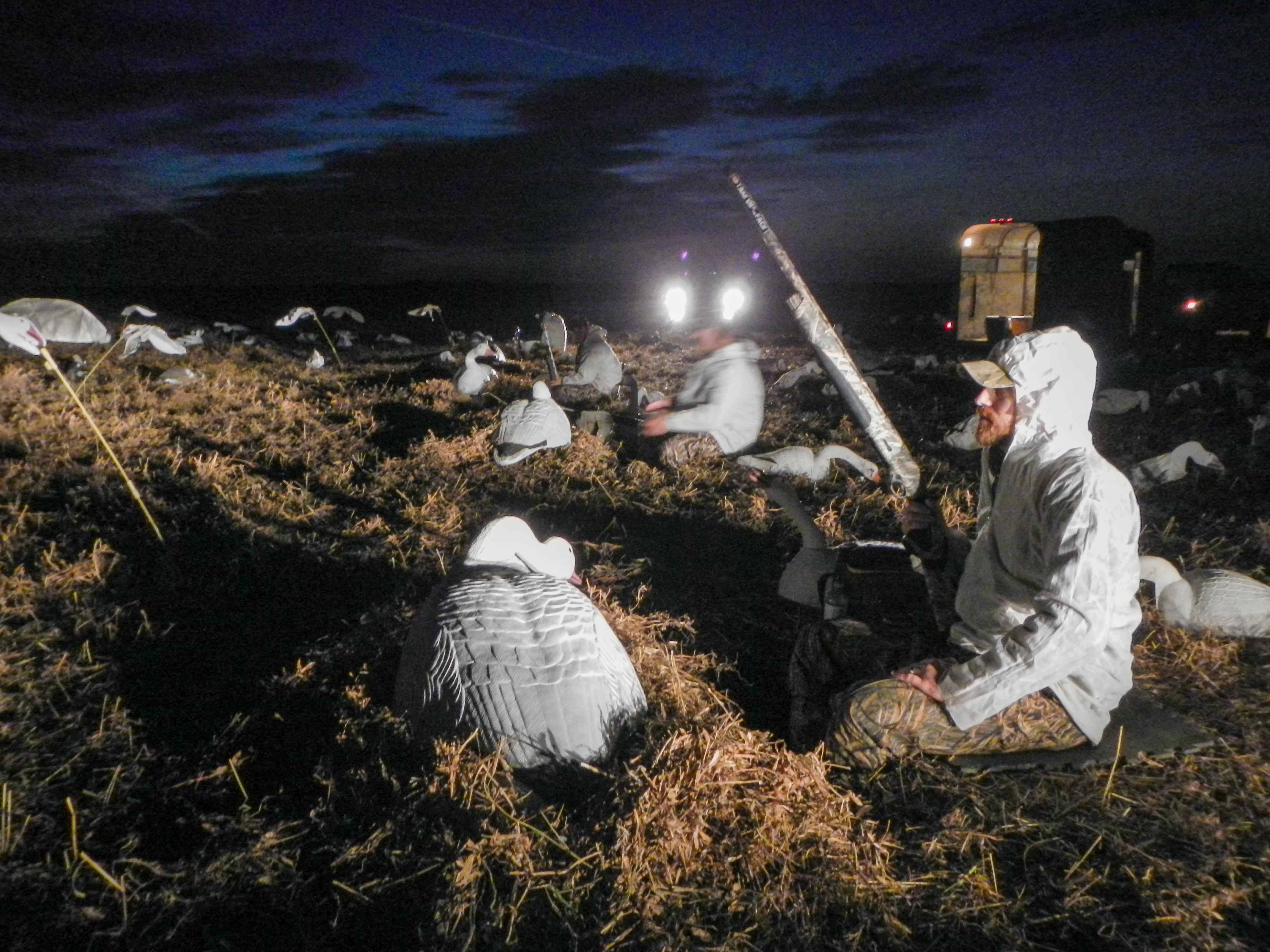 Hunters in a foxhole blind.