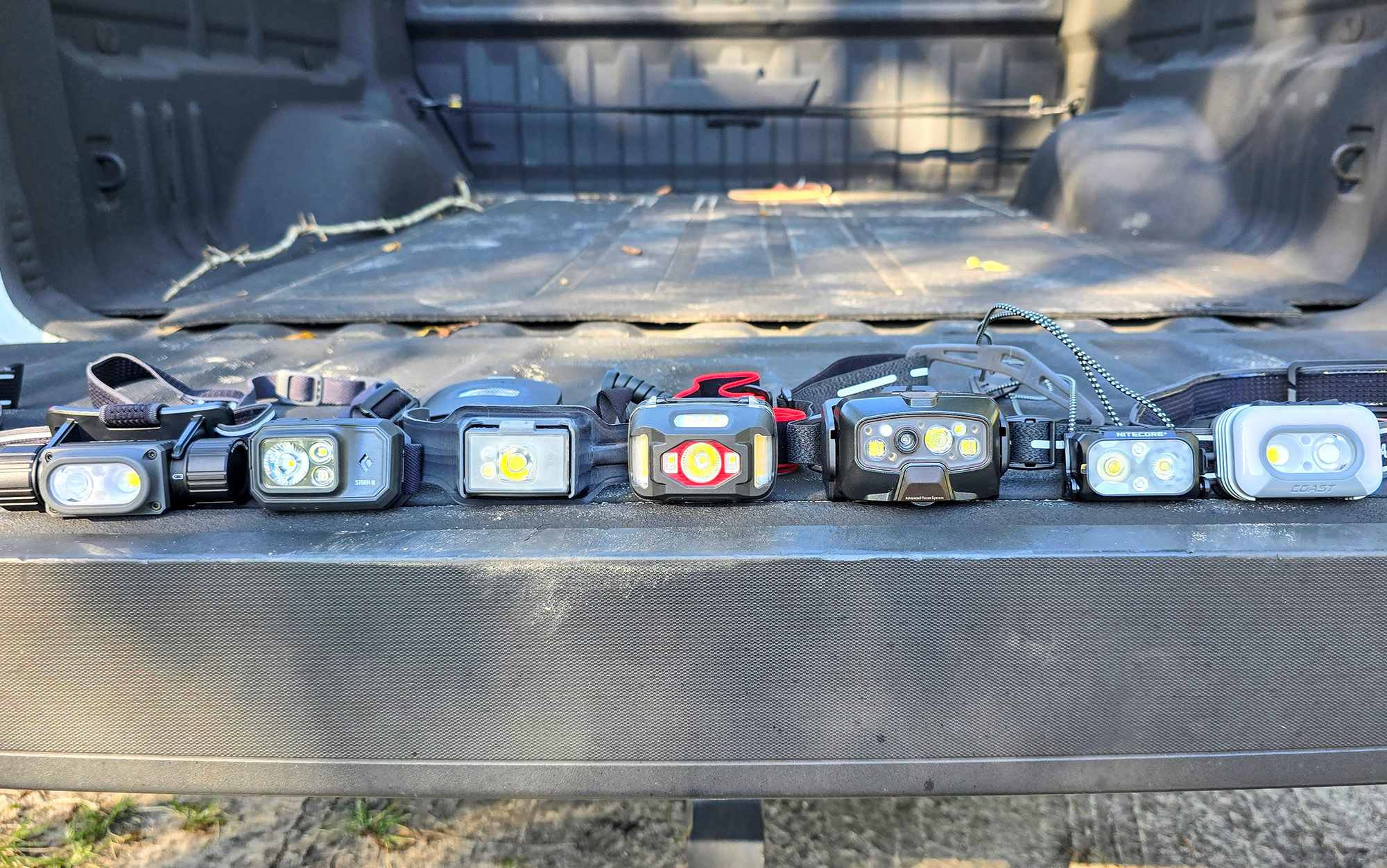 The best headlamps for hunting sit on a tailgate. 