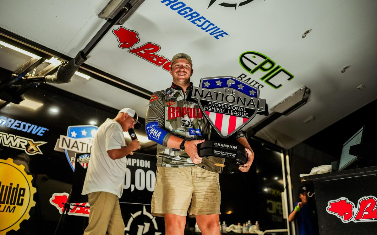 pro angler patrick walters with an NPFL trophy