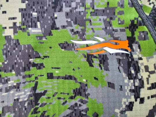 A close-up of Sitka's pixelated Optifade Cover camo pattern for eastern hunters