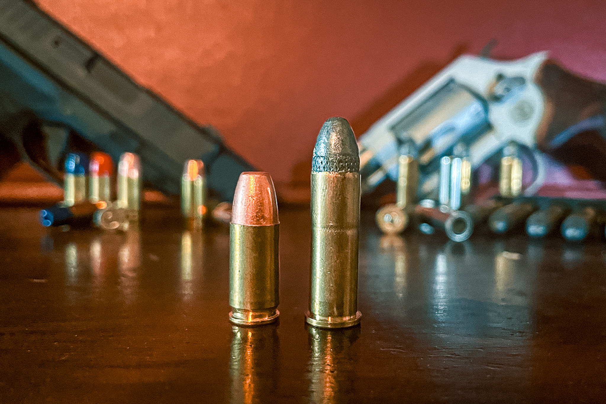 A 38 special cartridge (right) beside a 9mm cartridge.P