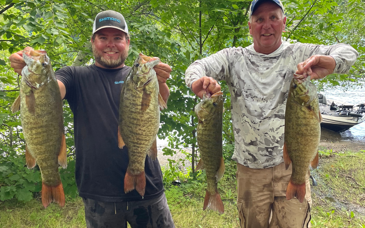 The author’s friend and his father with an almost 24-pound bag of smallmouth from Candlewood Lake. Noah Winslow