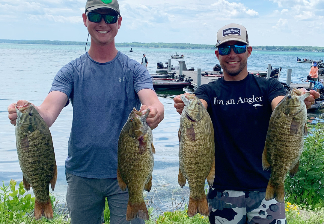 
The author and his fishing partner with their 19-pound bag of Cayuga Lake smallmouth.
