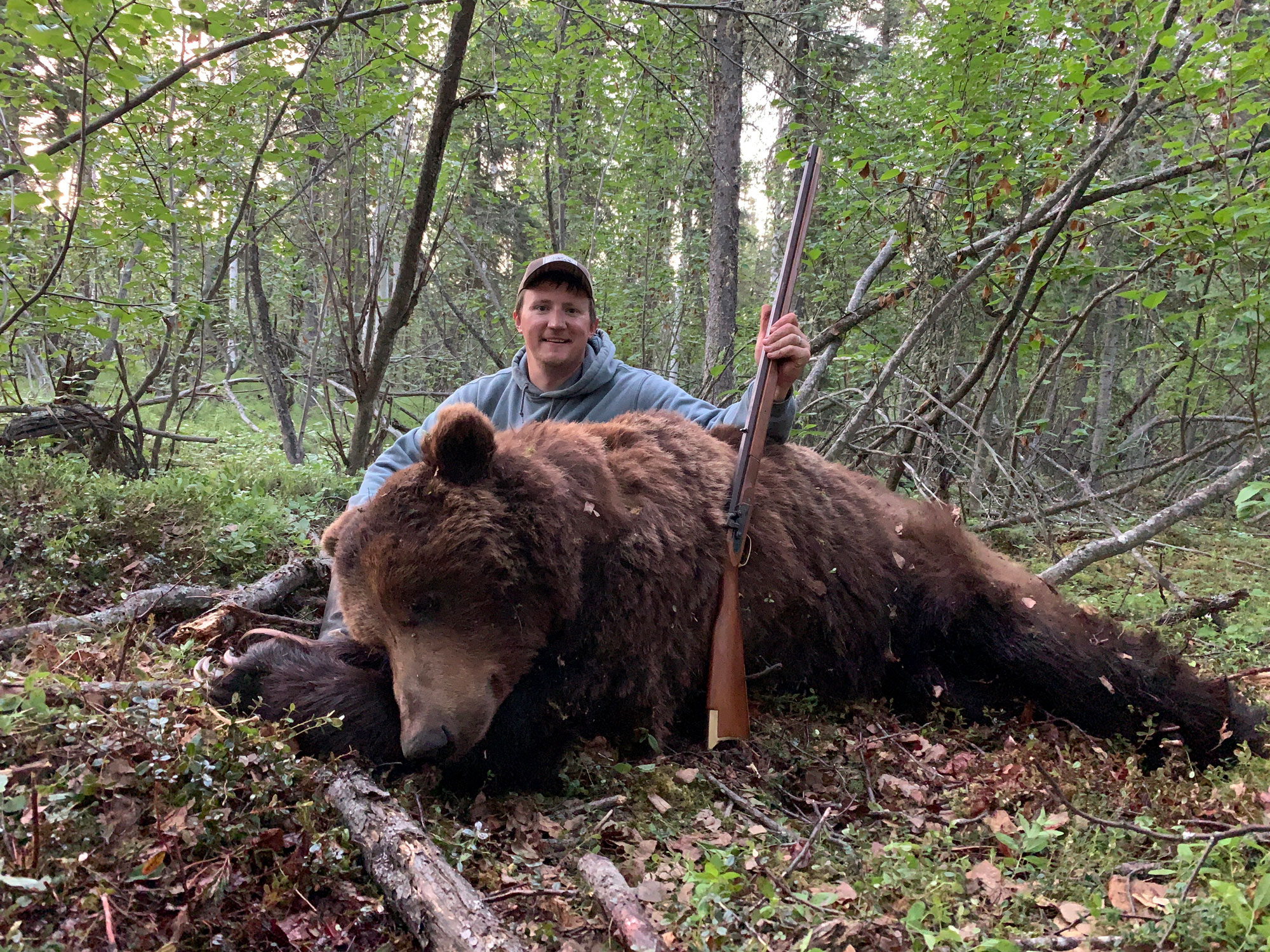 Tyler Freel with muzzleloader grizzly