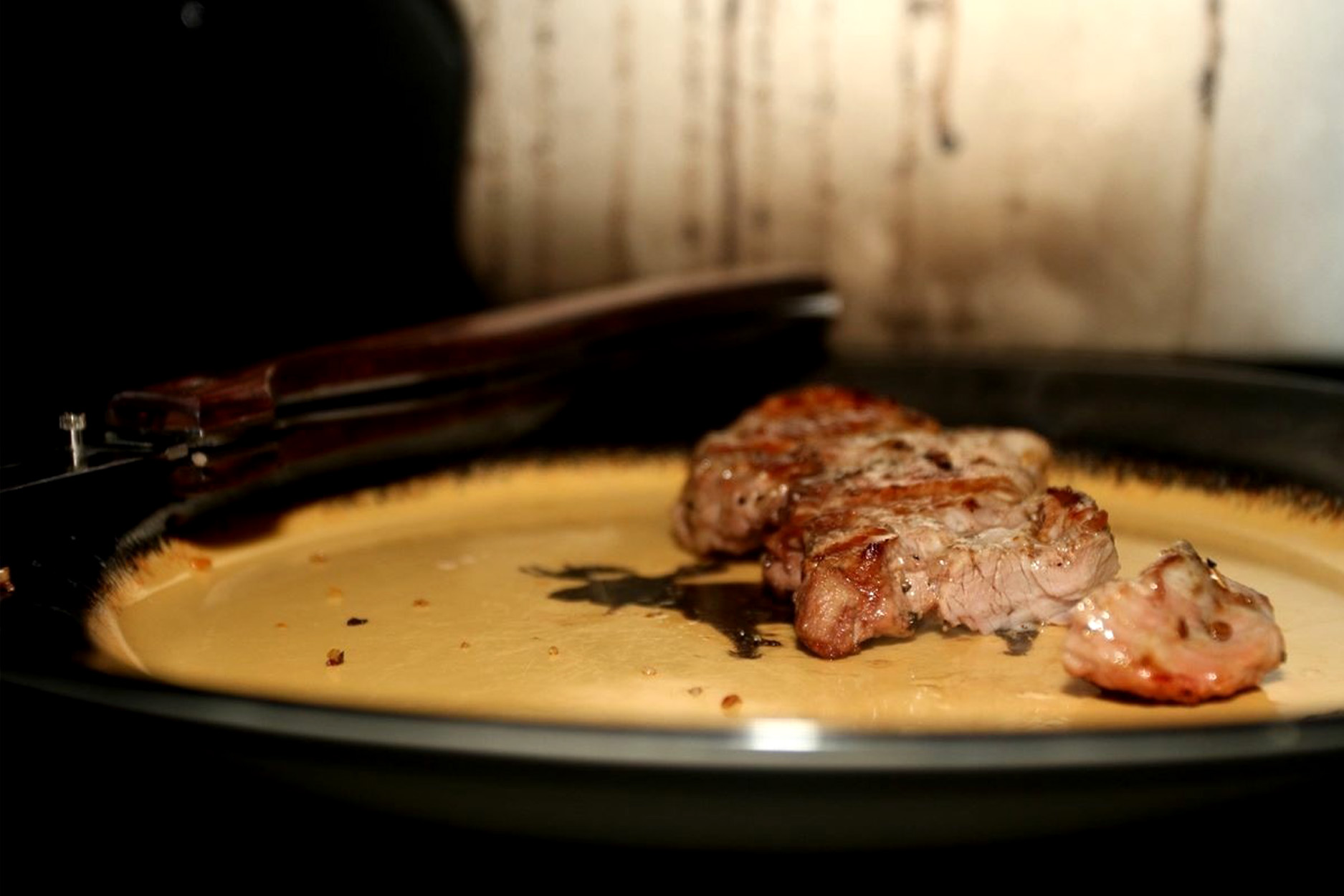 Mountain lion meat on a plate.