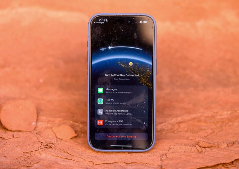 iphone 15 showing the satellite messenger screen with poor connectivity against a backdrop of red rock