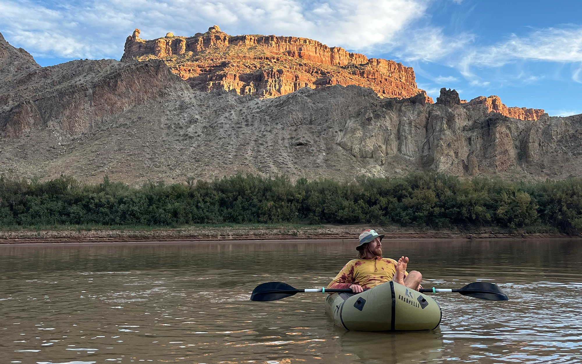 Paddler wears one of the best sun hats.