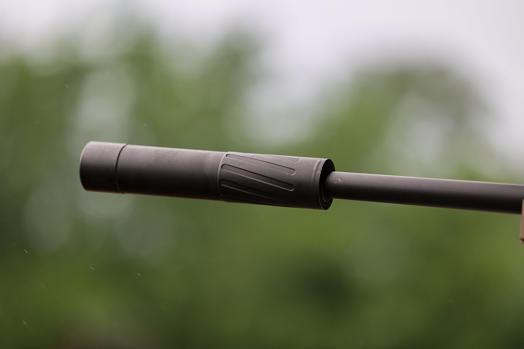 How to buy a suppressor like this one, attached to the end of a rifle barrel.