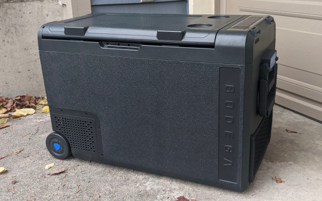 Bodega electric cooler in front of a garage