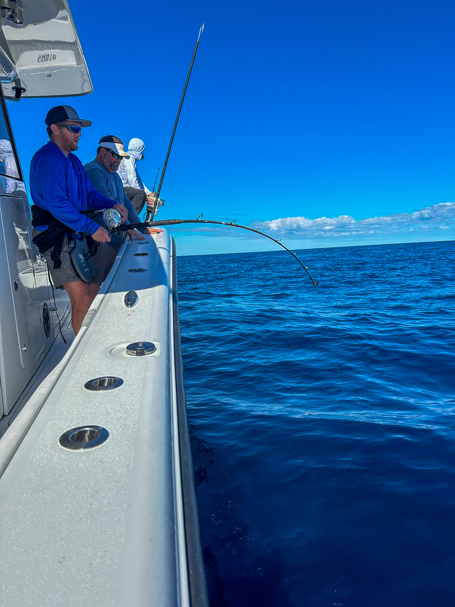 A man hooked up on a swordfish.