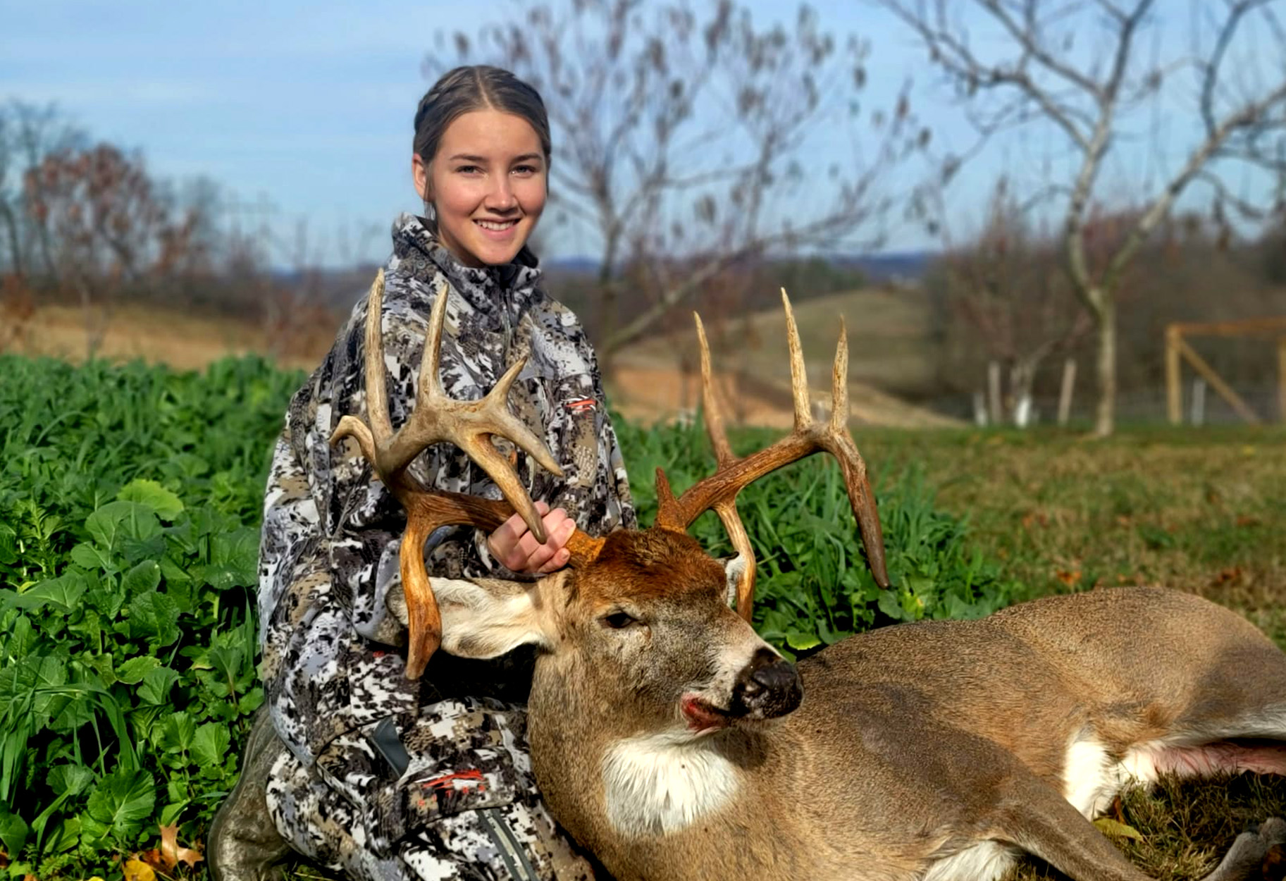 A teen hunter with a big Ohio buck.