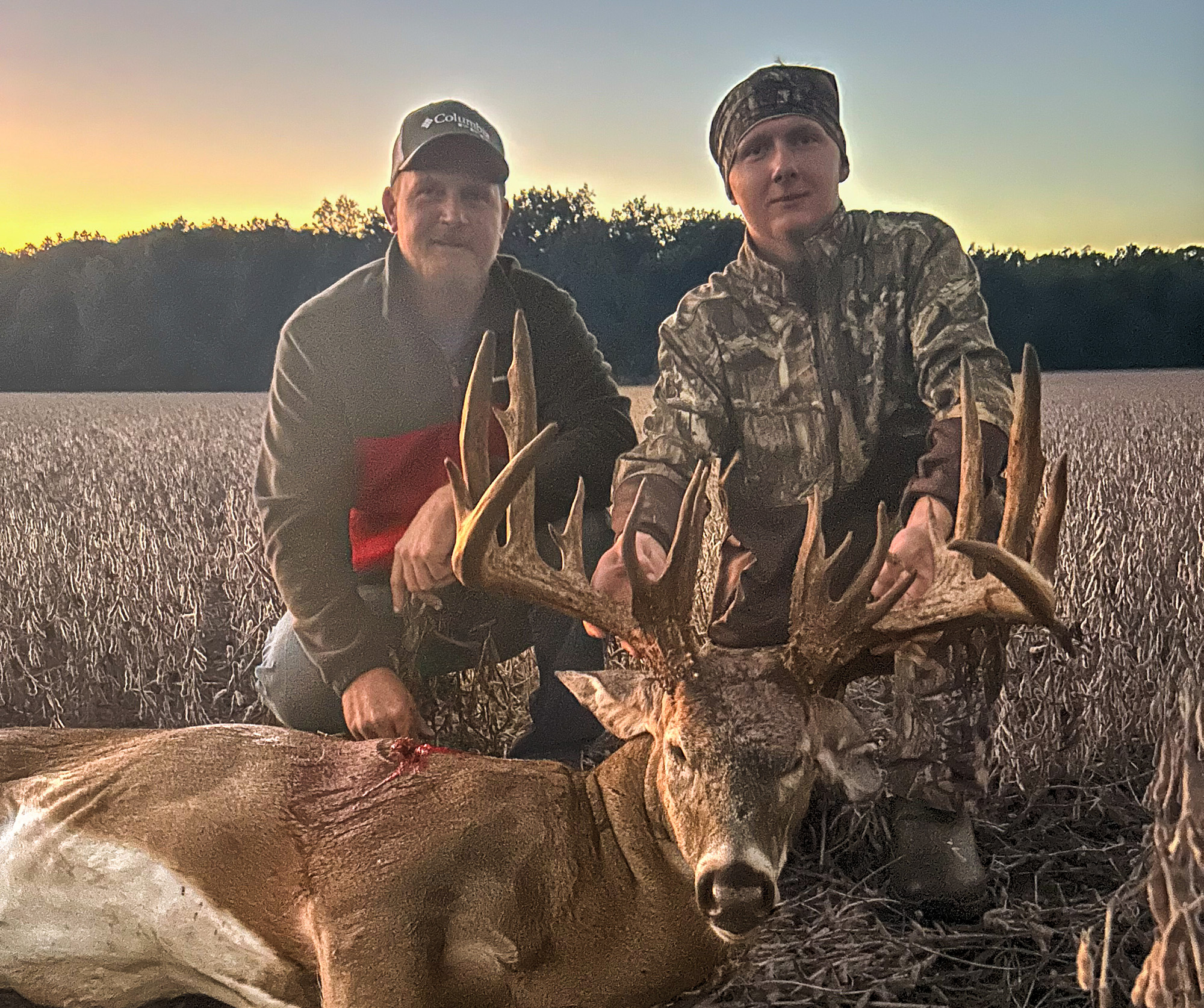 A hunter and his dad with a big Ohio buck.