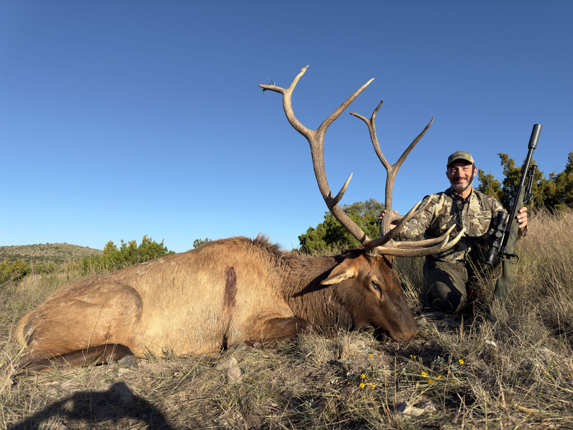 Shooting editor John B. Snow sits behind a nice bull he shot with the new 7mm Backcountry from Federal.