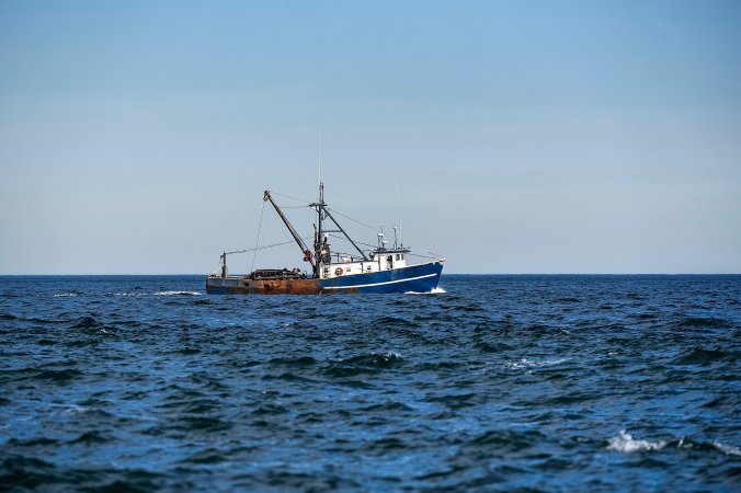 A commercial fishing boat at sea.