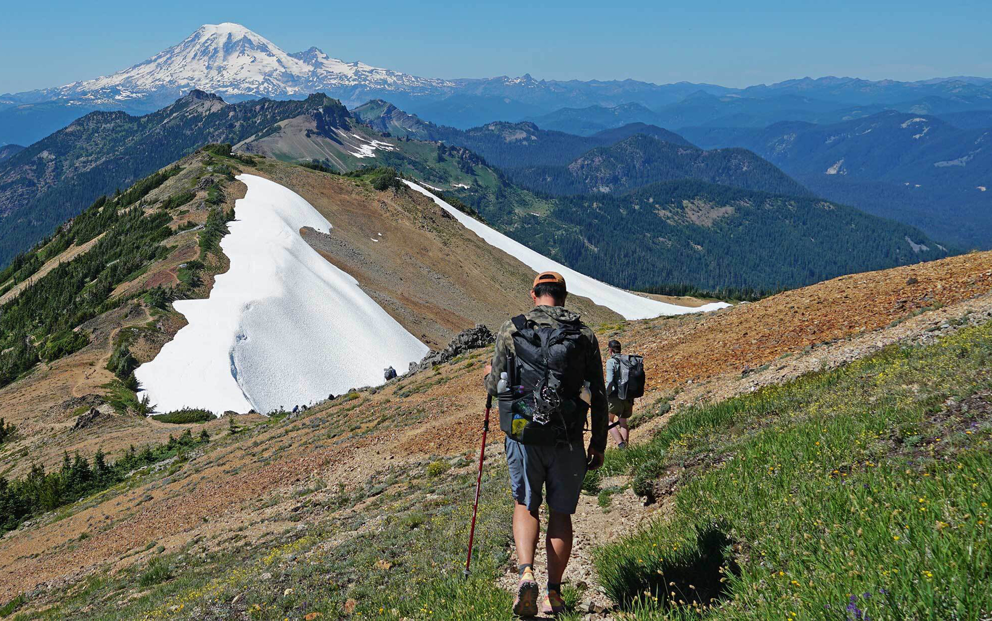 Robinson hikes the PCT in lightweight hiking shoes.