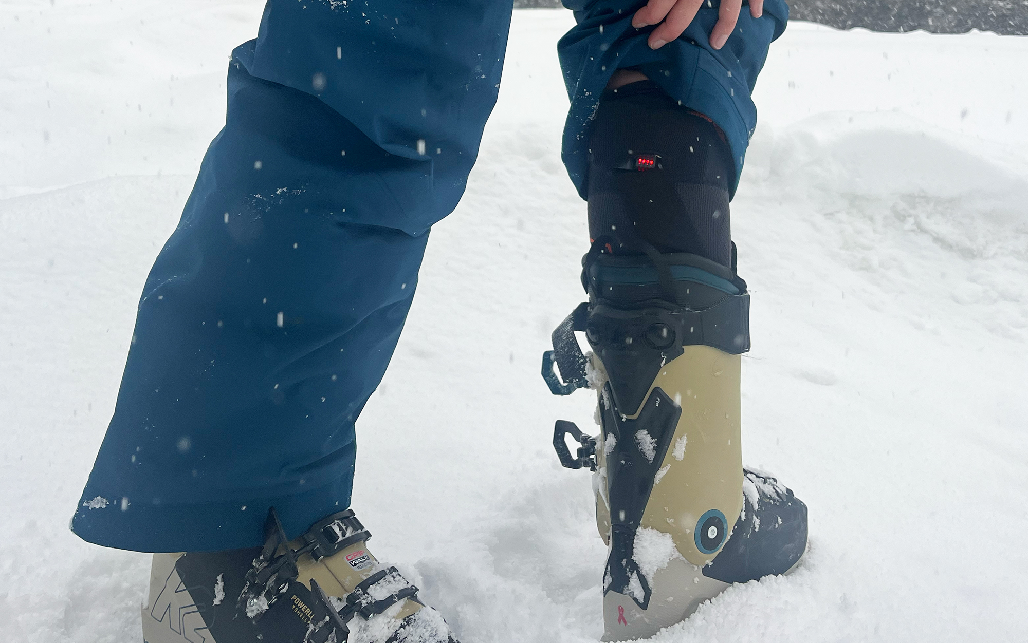 Author wears Hotronic heated ski socks in the snow.